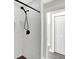 Bathroom with white tiled shower and black fixtures at 1019 N Beville Ave, Indianapolis, IN 46201