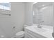 Clean bathroom with white vanity, toilet, and shower at 6293 Loraine Dr, Brownsburg, IN 46112