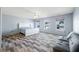 Spacious bedroom with wood-look floors and natural light at 2900 Lakestream Dr, Columbus, IN 47201