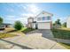 Two story house with brick and vinyl siding at 2900 Lakestream Dr, Columbus, IN 47201