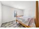 Charming bedroom with wood-look floors and a cozy bed at 2900 Lakestream Dr, Columbus, IN 47201