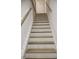 Modern staircase with white risers and light brown treads at 3131 Boulevard Pl, Indianapolis, IN 46208