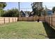 Large grassy backyard with new fence at 3131 Boulevard Pl, Indianapolis, IN 46208