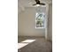 Bright bedroom with carpeted floor and a window offering natural light at 3131 Boulevard Pl, Indianapolis, IN 46208