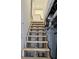 Unfinished wooden stairs leading to the basement at 3131 Boulevard Pl, Indianapolis, IN 46208