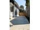 Long concrete driveway with wooden fence and landscaping at 3131 Boulevard Pl, Indianapolis, IN 46208