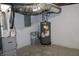 Unfinished basement with new water heater and HVAC unit at 3131 Boulevard Pl, Indianapolis, IN 46208