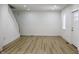 Bright living room with hardwood floors and white walls at 3131 Boulevard Pl, Indianapolis, IN 46208