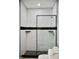 Modern shower with black frame glass enclosure and subway tile at 3131 Boulevard Pl, Indianapolis, IN 46208