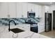 Modern kitchen featuring white cabinets, quartz countertops, and stainless steel appliances at 3131 Boulevard Pl, Indianapolis, IN 46208