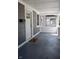 Front porch with gray flooring and a welcome mat at 3131 Boulevard Pl, Indianapolis, IN 46208
