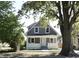 Charming gray two-story house with white trim at 3131 Boulevard Pl, Indianapolis, IN 46208