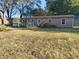 Rear view of house, showing yard and deck at 108 W 650 South, Pendleton, IN 46064