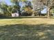 Large backyard with shed and mature trees at 108 W 650 South, Pendleton, IN 46064