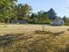 Large backyard with mature trees and a shed at 108 W 650 South, Pendleton, IN 46064