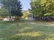 Side view of the house with green lawn at 108 W 650 South, Pendleton, IN 46064