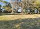 Large backyard with mature trees at 108 W 650 South, Pendleton, IN 46064