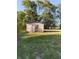 Rustic storage shed in a grassy backyard setting at 108 W 650 South, Pendleton, IN 46064