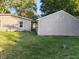 Side view of house and garage, showcasing exterior details at 108 W 650 South, Pendleton, IN 46064
