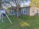 Ranch home with a porch and landscaped yard at 108 W 650 South, Pendleton, IN 46064