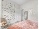 Bedroom with a unique flower wall and a comfortable sitting area at 1429 Terrace Ave, Indianapolis, IN 46203