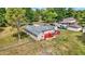 Brick house with a red deck and fenced backyard at 3688 Lisa Ln, Plainfield, IN 46168