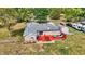 Brick house with a spacious red deck and fenced backyard at 3688 Lisa Ln, Plainfield, IN 46168