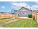 Newly built home with a fenced backyard and deck at 1245 N Mount St, Indianapolis, IN 46222