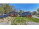 Two newly constructed homes with wooden decks and grassy yards at 3006 N Olney St, Indianapolis, IN 46218