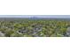 Aerial view of neighborhood with city skyline at 3006 N Olney St, Indianapolis, IN 46218