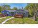 Newly built gray house with a wooden deck and walkway at 3006 N Olney St, Indianapolis, IN 46218
