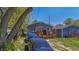 House with deck and cars parked in backyard at 3006 N Olney St, Indianapolis, IN 46218