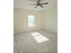 Bright bedroom with a ceiling fan and carpeting at 525 Schmitt Rd, Indianapolis, IN 46239