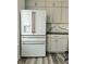 Modern kitchen with white appliances and gray cabinets at 525 Schmitt Rd, Indianapolis, IN 46239