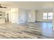 Spacious living room with hardwood floors and high ceilings at 525 Schmitt Rd, Indianapolis, IN 46239