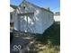 Detached garage with white siding and a single door at 616 W 38Th St, Anderson, IN 46013
