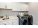 Laundry room with white cabinets, washer, and dryer at 750 Keck Way, Westfield, IN 46074