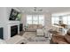 Spacious living room featuring a cozy seating area and fireplace at 750 Keck Way, Westfield, IN 46074