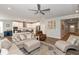 Bright and airy living room with a view into the kitchen and entryway at 750 Keck Way, Westfield, IN 46074