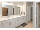 Bathroom boasts double vanity, large mirror, and access to other rooms at 750 Keck Way, Westfield, IN 46074