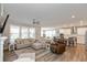 Open living space with kitchen, island, and hardwood floors at 750 Keck Way, Westfield, IN 46074