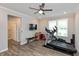 Home gym with treadmill, other equipment, and adjacent bathroom at 750 Keck Way, Westfield, IN 46074