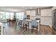 Modern kitchen with white cabinets, island, and stainless steel appliances at 750 Keck Way, Westfield, IN 46074