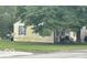 Tan house side view with landscaping at 3816 St Charles St, Anderson, IN 46013