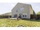 Large backyard with a wooden deck and grassy area at 2307 Blackthorn Dr, Franklin, IN 46131