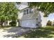 Two-story house with attached garage and mature trees at 2307 Blackthorn Dr, Franklin, IN 46131