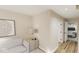 Finished basement with comfortable sitting area and access to garage at 5736 Birtz Rd, Indianapolis, IN 46216