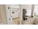 Shared bathroom with double vanity and view of bedroom at 5736 Birtz Rd, Indianapolis, IN 46216