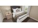 Cozy bedroom with a double bed and neutral tones at 5736 Birtz Rd, Indianapolis, IN 46216