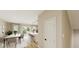 Bright dining room with hardwood floors and access to kitchen at 5736 Birtz Rd, Indianapolis, IN 46216